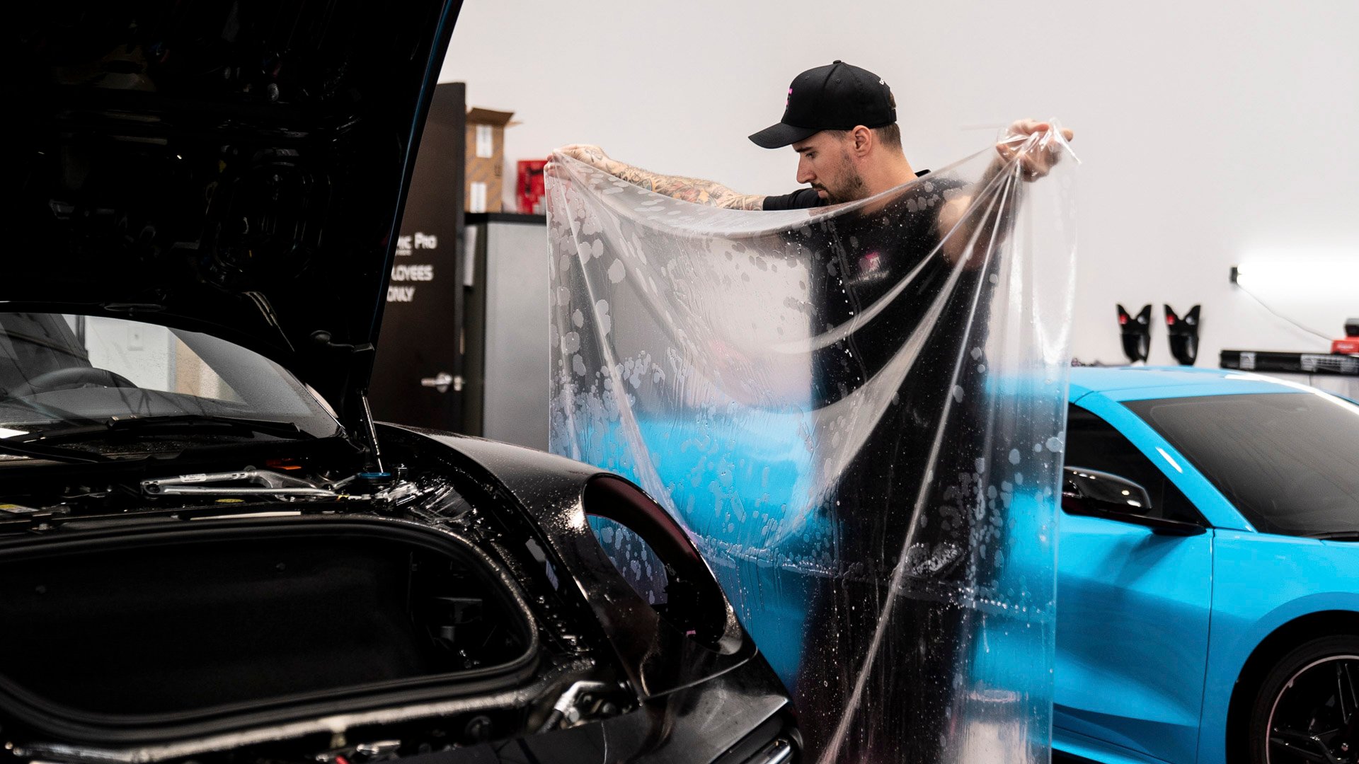 Full body paint protection film installed on black Range Rover